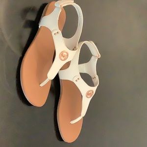 Gently used girls white sandals with rose gold accents by Michael Kors, size 2